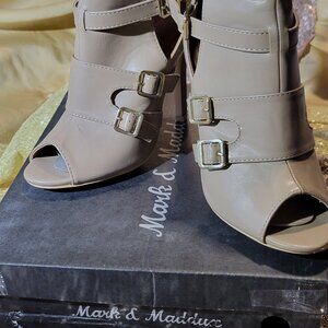 Women's beige bootie, 4 inch heels and buckles in size 6.5 by Marc Maddusc